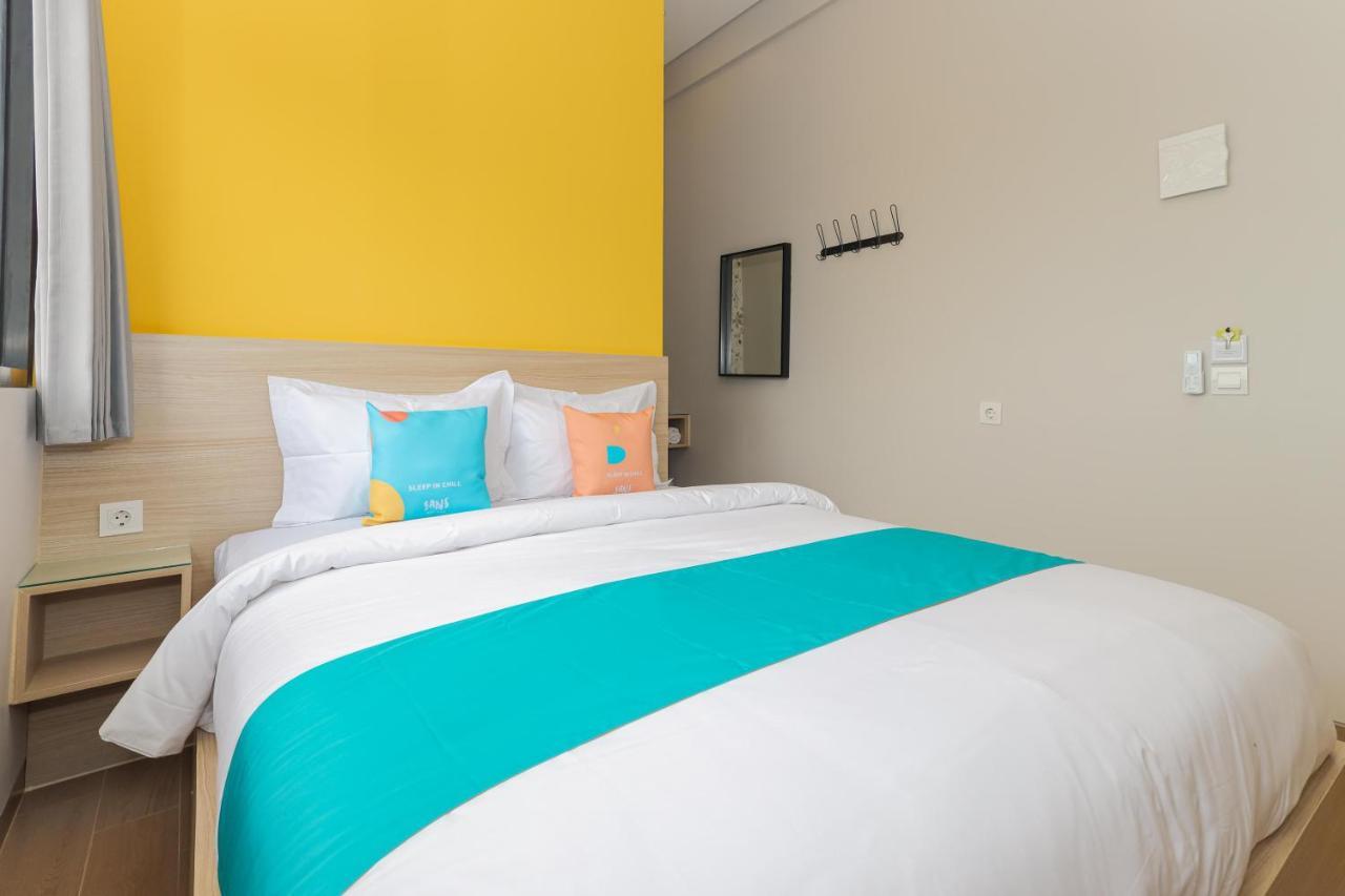 Sans Hotel Clover Ace Surabaya By Reddoorz Exterior photo